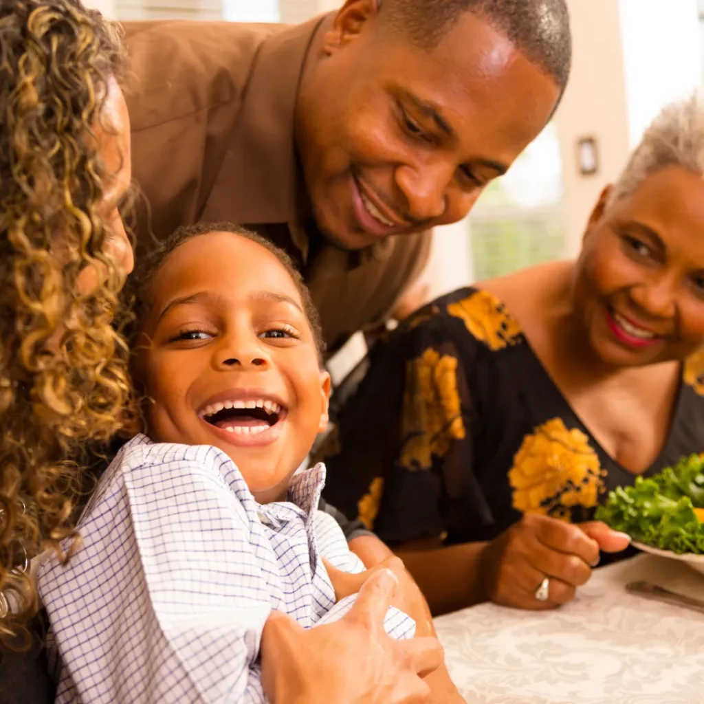 Young boy with family